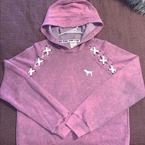 women’s cropped PINK hoodie.